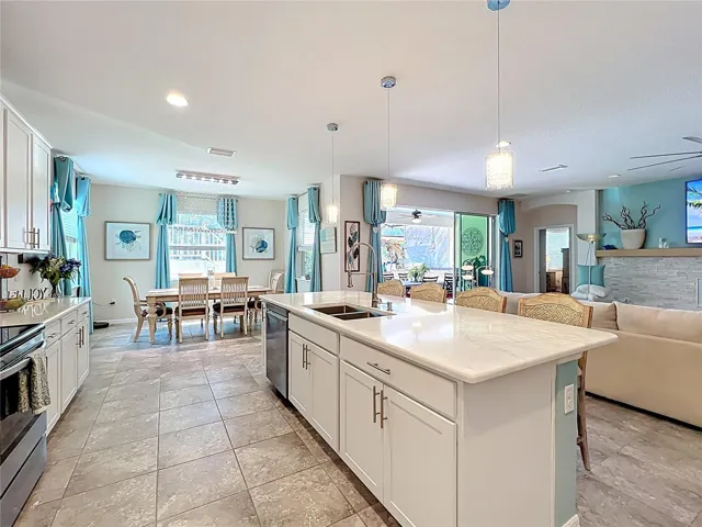 Kitchen Opens to Dining and Living Rooms