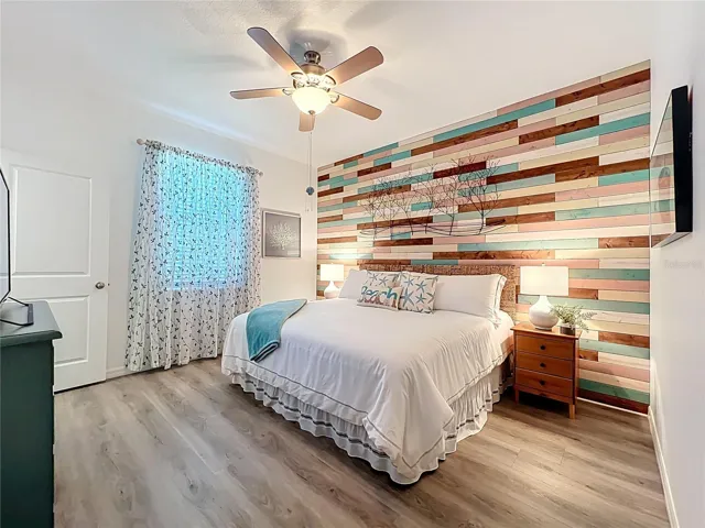 Guest Bedroom with Custom Wood Wall