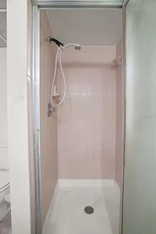 Walk-In Shower. The primary bath includes a walk-in shower for everyday convenience.