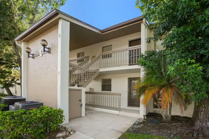 Ground-Floor Convenience in Tarpon Woods. Tucked beneath a canopy of mature trees in the sought-after East Lake corridor, this 2-bedroom, 2-bath condo offers easy access and a low-maintenance lifestyle.