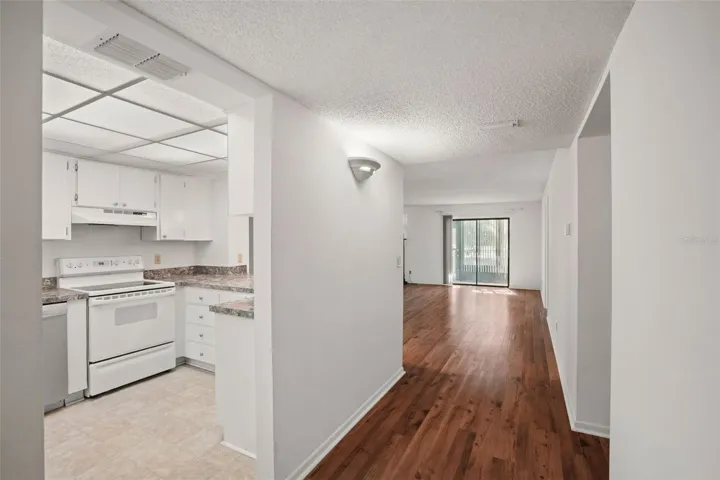 Step Inside. Neutral finishes, durable laminate flooring, and an open living and dining area create a comfortable space that's ready for your personal style.