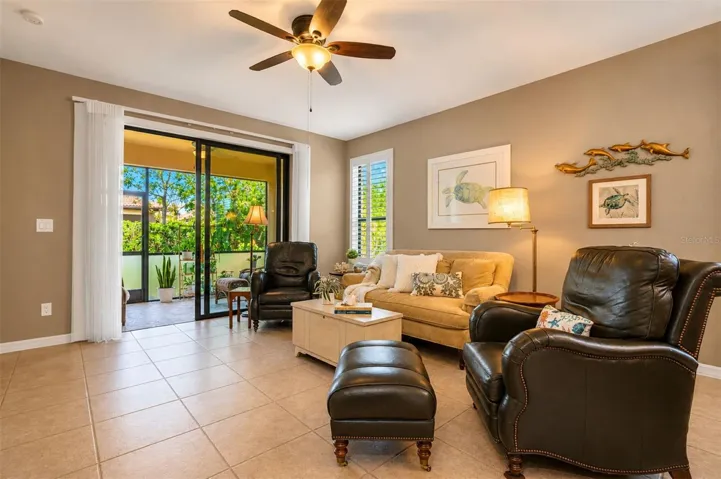 Open layout to screened patio. Tile throughout. Plantation shutters newly installed.
