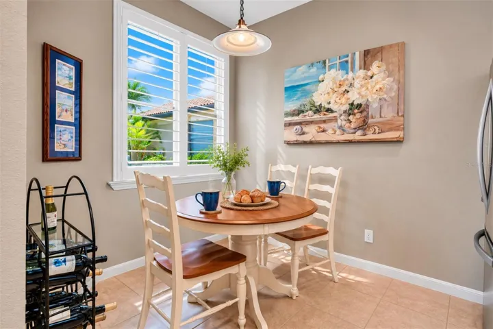 Coastal farmhouse breakfast nook with sunlight