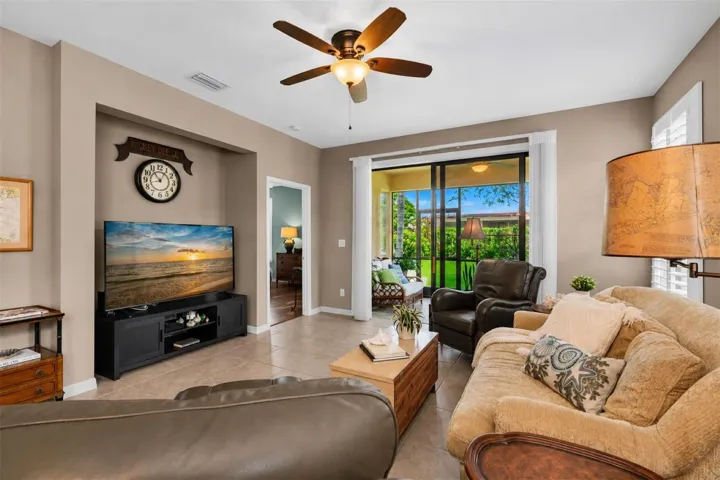 Open layout to screened patio. Tile throughout. Plantation shutters newly installed.