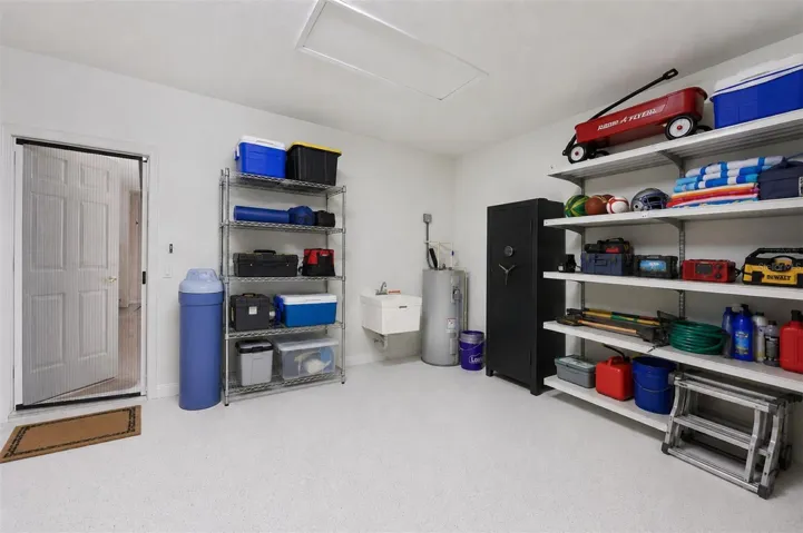 Remote opener garage has water softener , sink , safe. Current owner never used the water softner.