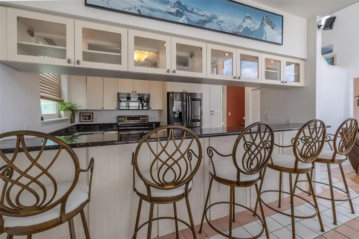 Counter bar with lighted cabinets!