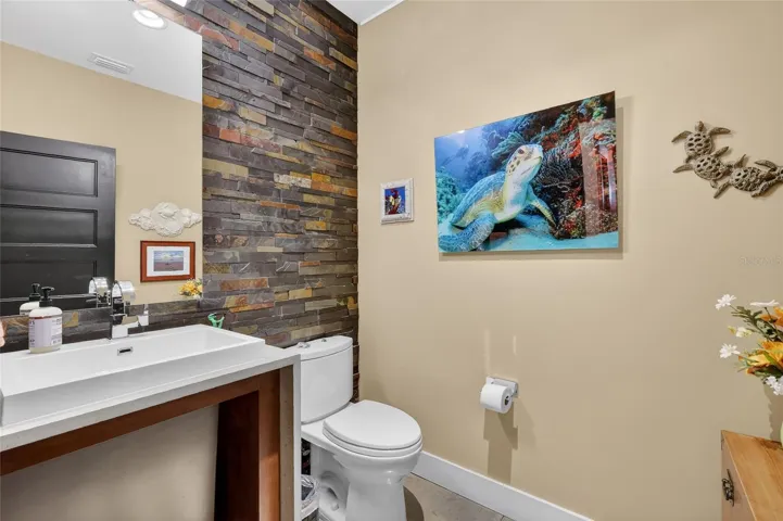 1/2 Bath with Stacked Stone and Custom Vanity