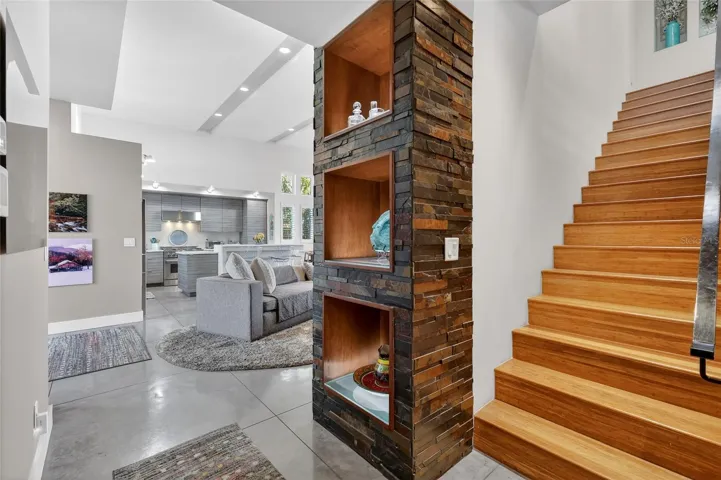Modern, Back-Lit Display Niches Enveloped with Stacked Stone