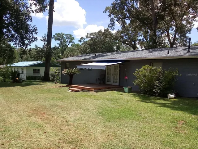 Back of House with Deck/Awning