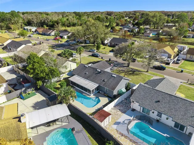 Aerial view of surrounding homes