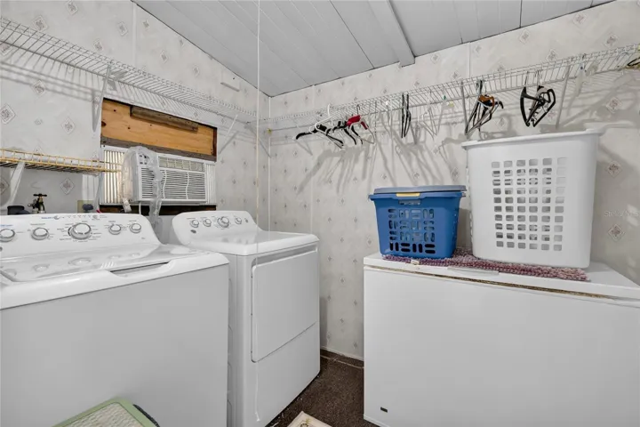 Climate controlled Laundry room with Freezer outside separate room