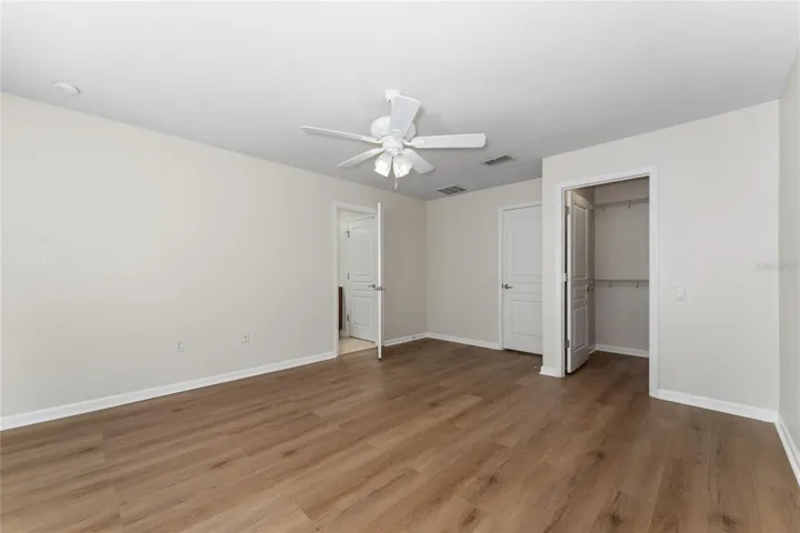 Master bedroom with walk-in closet