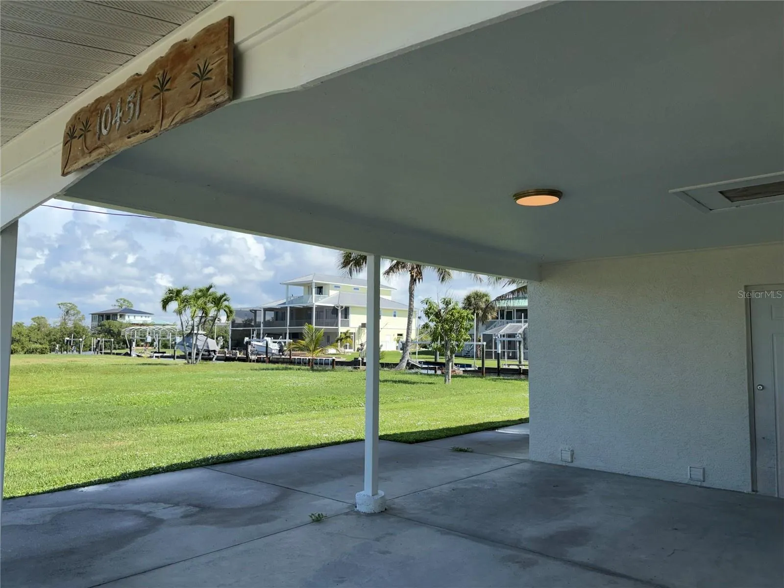 Carport with access to home through second bathroom