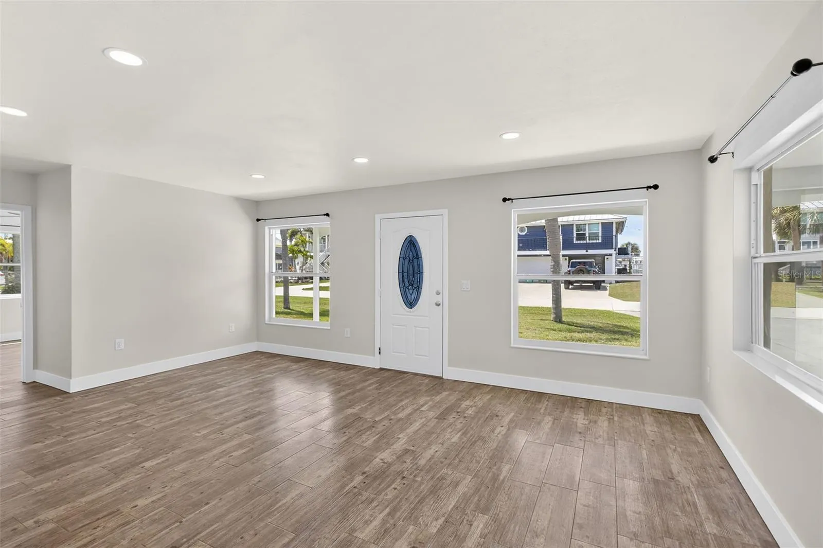 View from kitchen to the front entry.