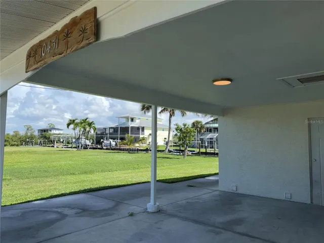 Carport with access to home through second bathroom
