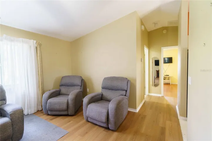 Great room and hallway to guest bedroom