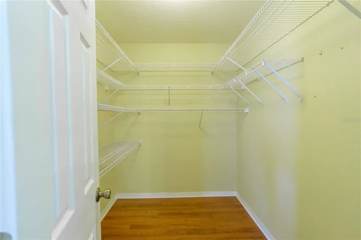 Walk in closet in guest bedroom