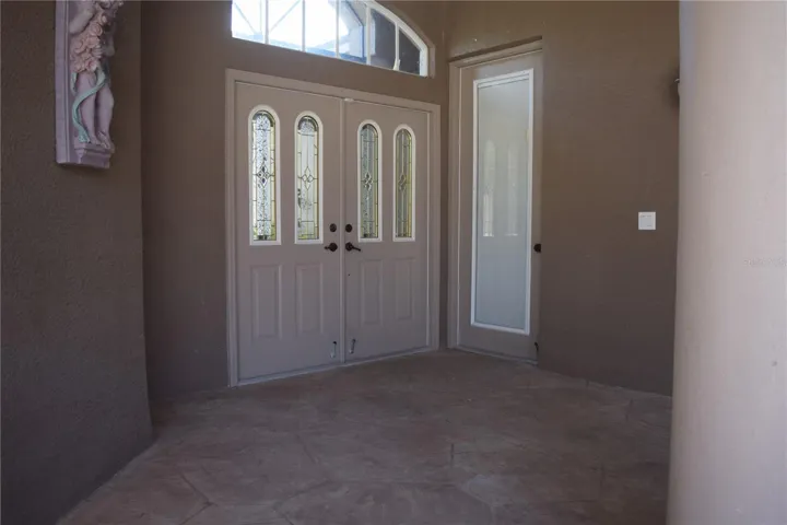 Inside the courtyard looking at the front door.