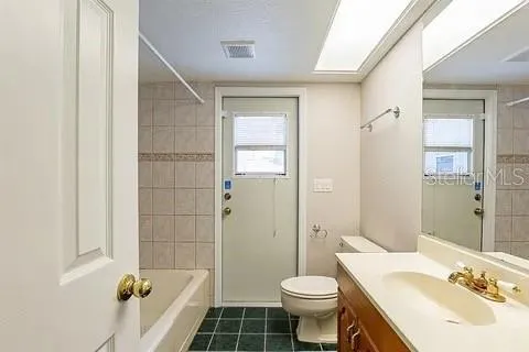 Guest bathroom with pool access