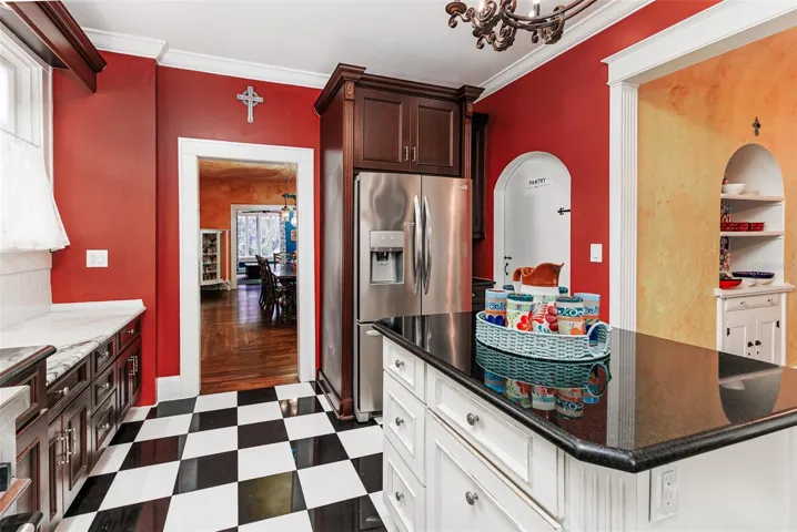 Gourmet Kitchen with Center Island and Pantry Closet