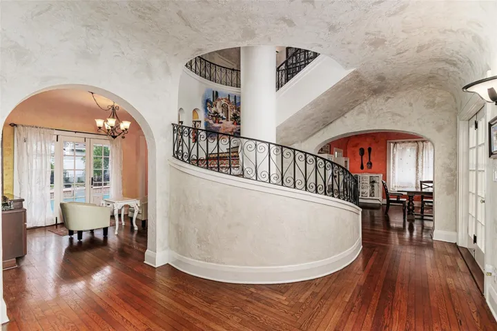 Sweeping Staircase in the Heart of the Home