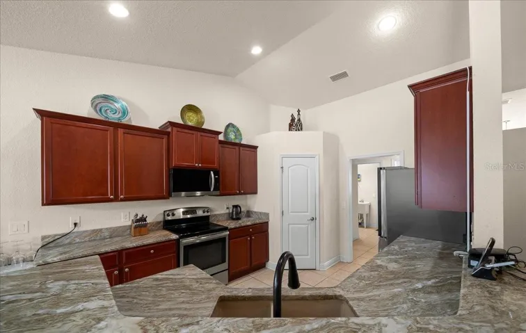 Beautful cabinets ad granite countertops