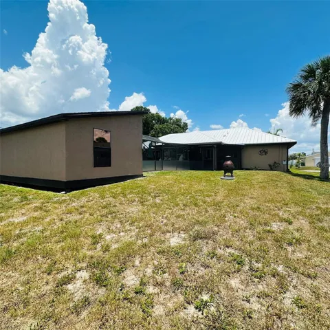 back (shed on left with pool between shed and hosue)