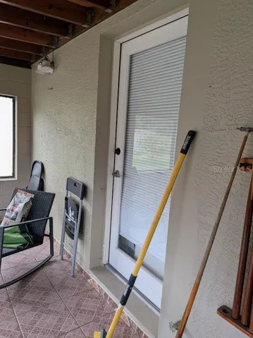 Master Bedroom private door leading to porch