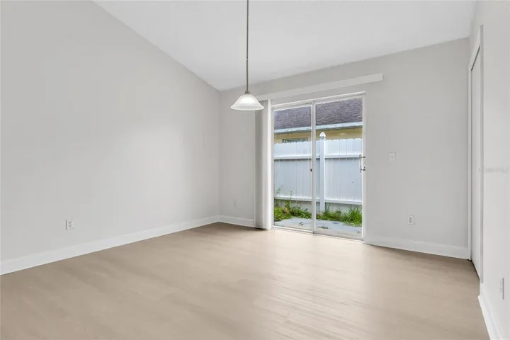 Dining Room & Sliding Glass Door to Exterior
