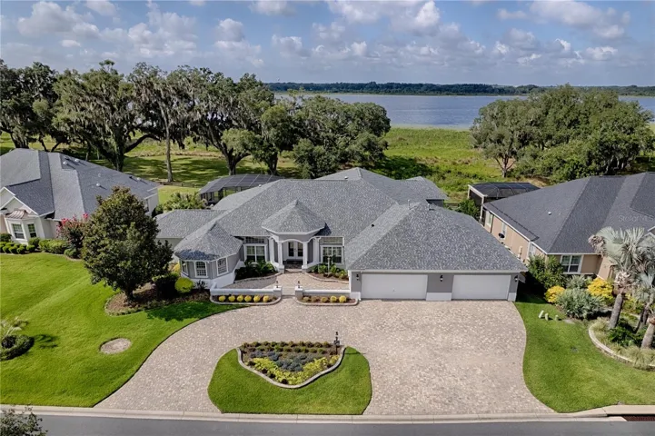 ON APPROX HALF ACRE LOT