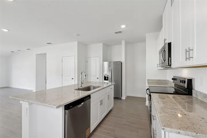 The interior photos are of another home with the same floor plan and interior finishes. Some details may vary