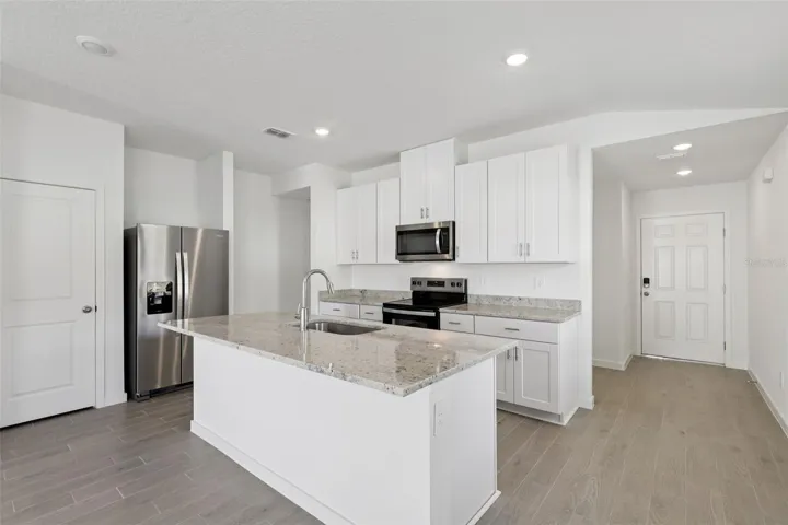 The interior photos are of another home with the same floor plan and interior finishes. Some details may vary