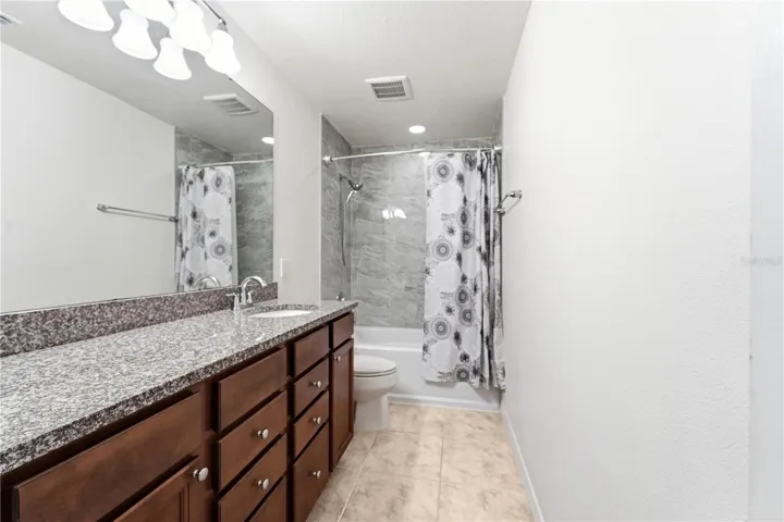 Third full Bathroom upper level. Excellent counter pace.