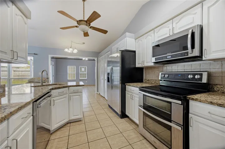 Kitchen with Stainless appliances and granit