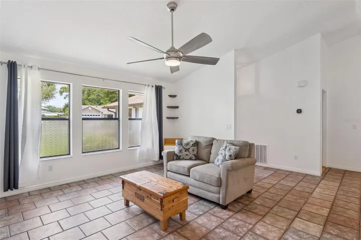 Living room, large open windows for natural light