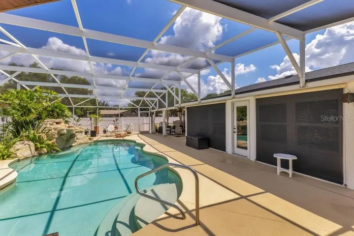 Pool view with remote controlled solar shades