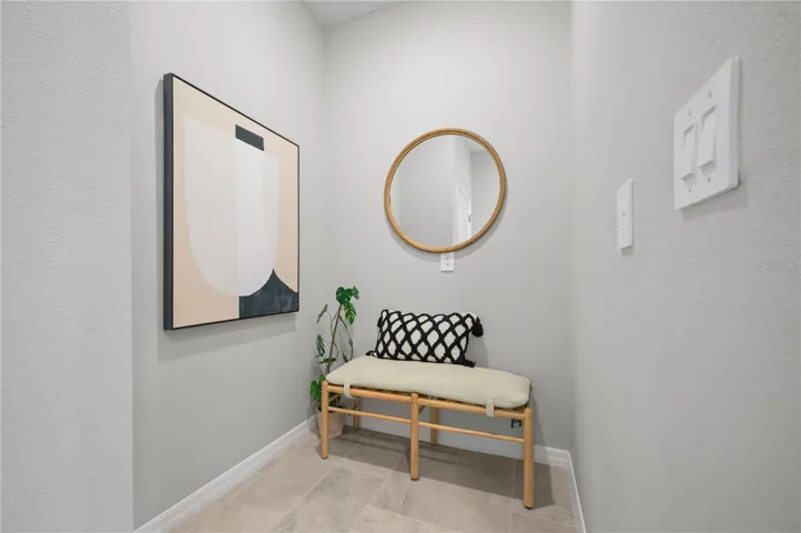 Mudroom/drop zone adjacent to garage