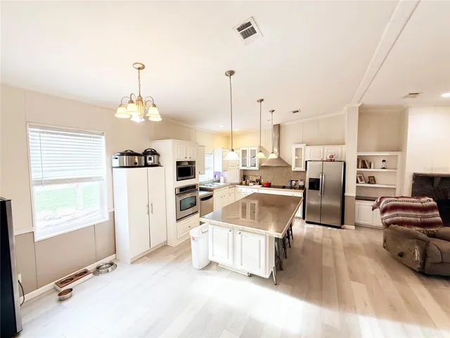 nice kitchen with lots of counter space and ss appliances