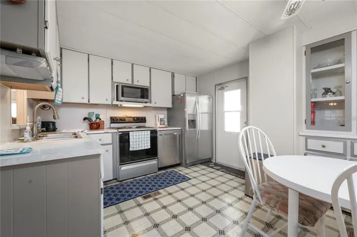 Ample cabinets and counter space in this surprisingly large kitchen