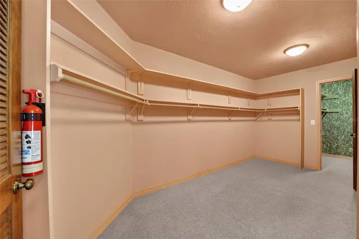 Primary Walk-In Closet 1