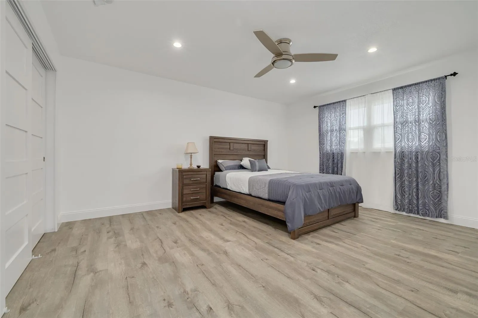 2nd Bedroom with high-end 5 panel doors and a spacious layout.