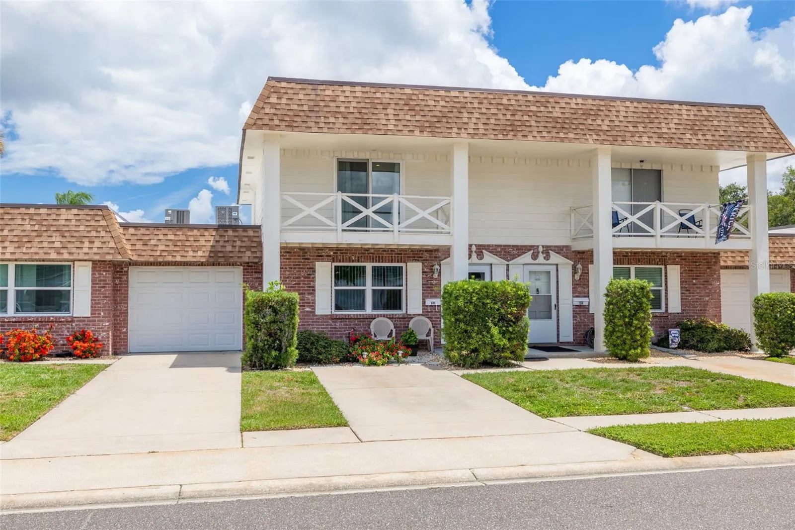 Nice driveway with additional guest parking right across the street (super convenient)