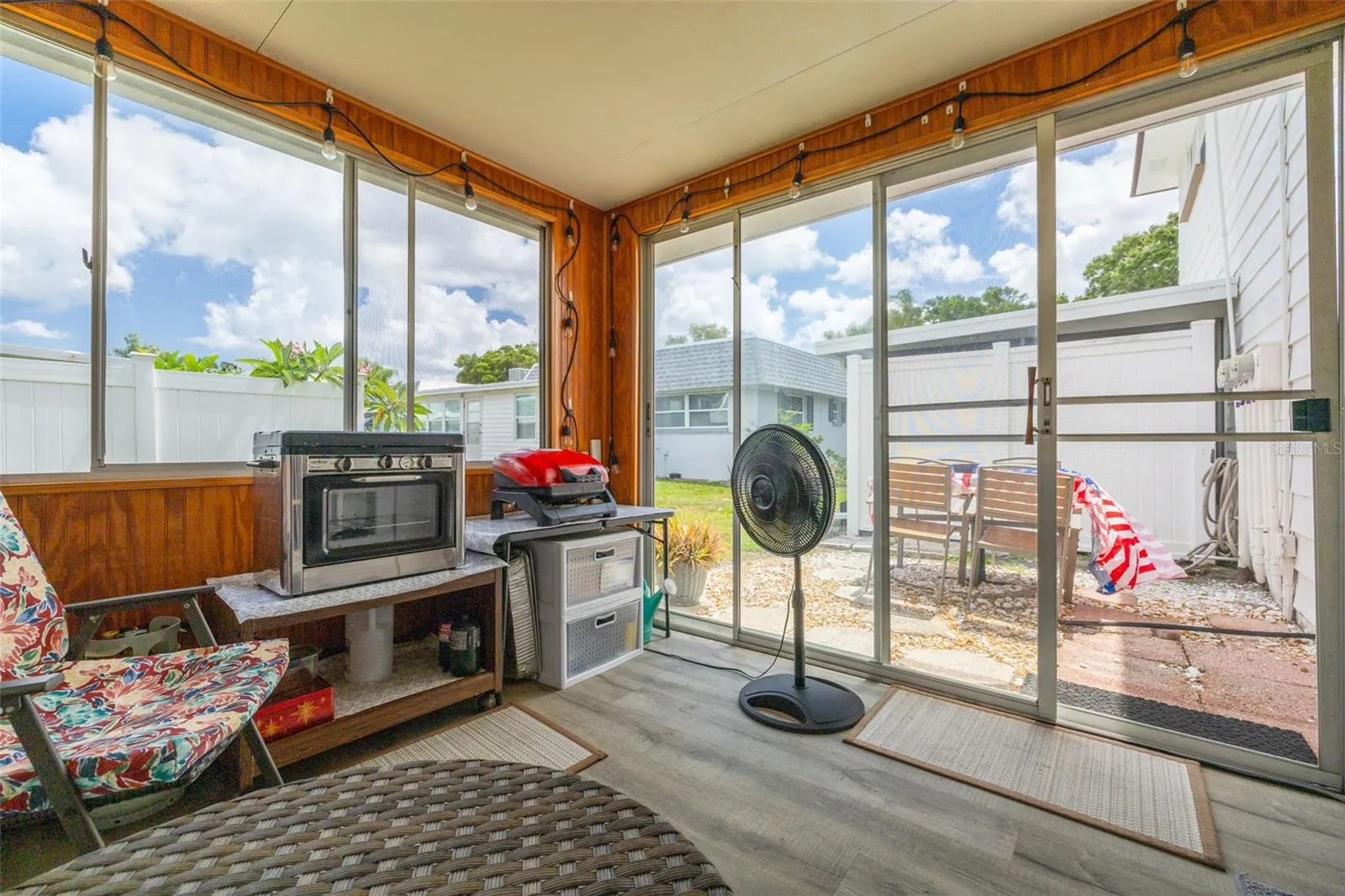 Private outdoor patio space is perfect for grilling or planting your favorite raise bed garden.