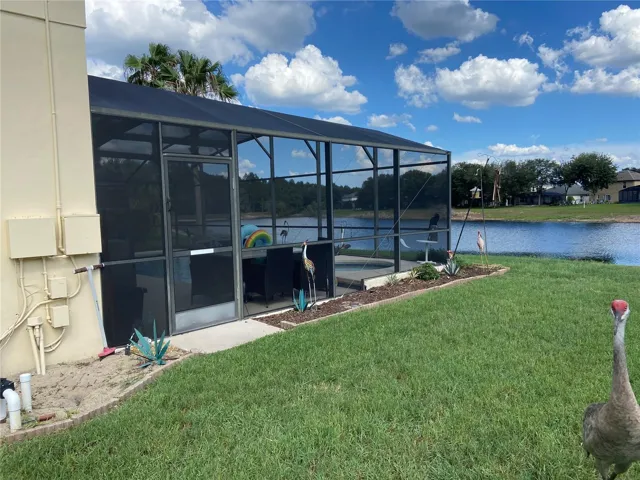 Side view of pool overlooking the water.