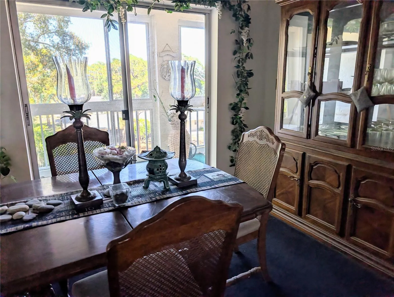 Dining room with quiet view of enclosed lanai