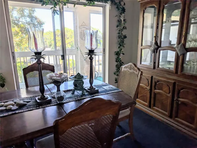 Dining room with quiet view of enclosed lanai