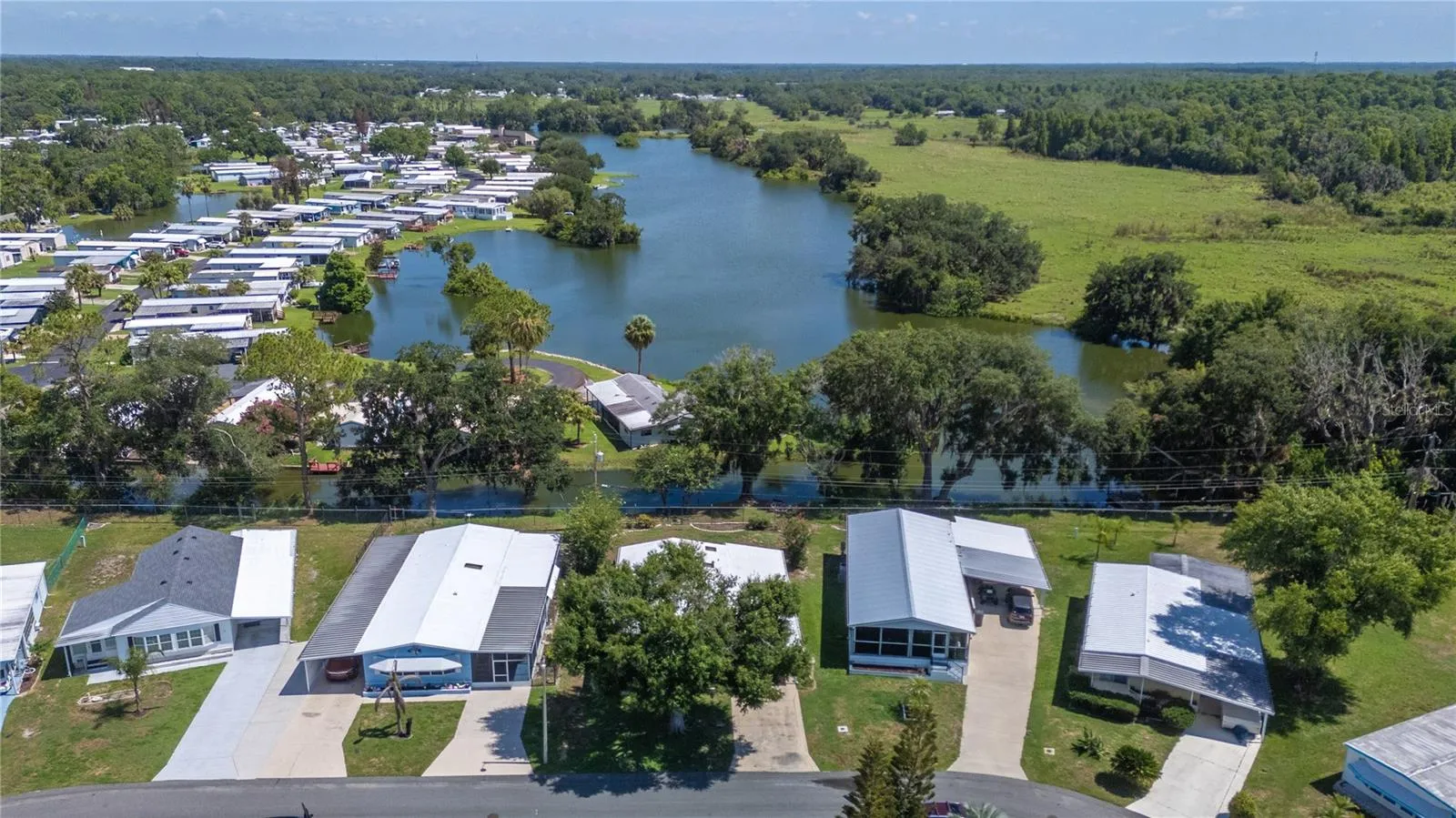 Lot 333 backs to Anglers Lake!