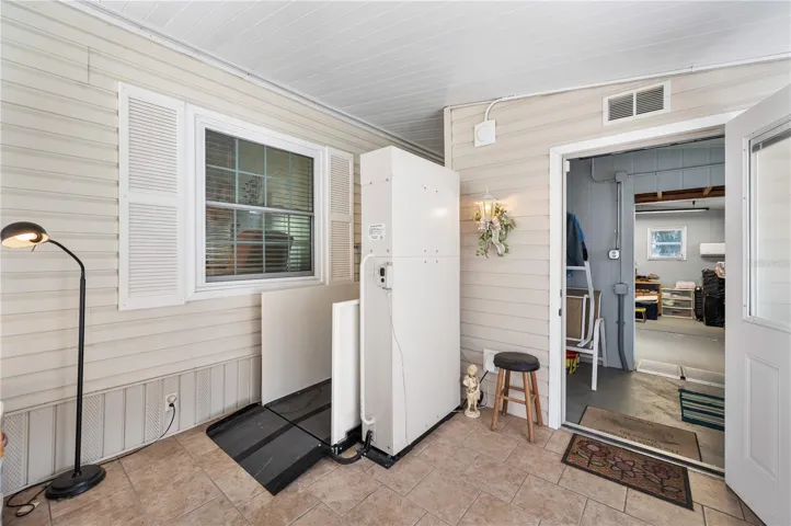 Florida room with chairlift elevator