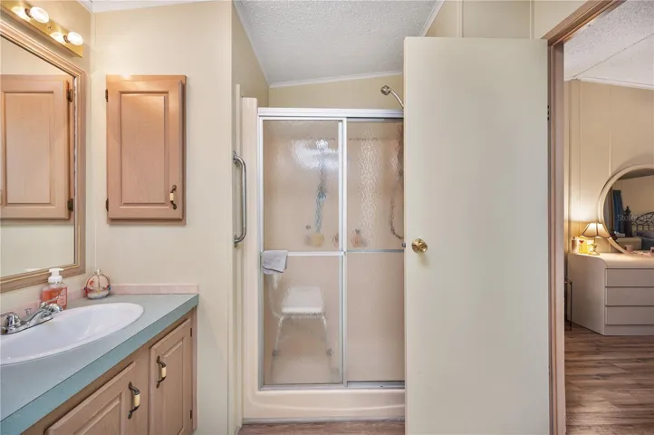 Primary bathroom with shower stall