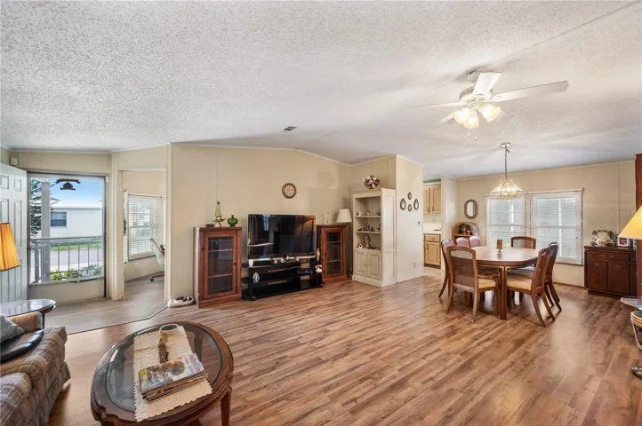 Spacious living room opens to dining room